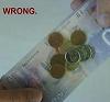 the wrong way to hand change