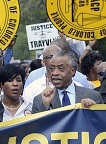 Rev. Jesse Jackson, Rev. Al Sharpton, and NAACP President Benjamin Justice lead a NAACP march and rally for Trayvon Martin in front of the Sanford Police Department in Sanford, Florida, Saturday March 31.