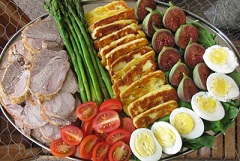 salmagundi - A dish composed of chopped meat, anchovies, eggs, onions with oil and condiments