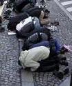 Muslims pray in the street during Friday prayers near the Poissonniers street Mosque in Paris December 17, 2010.