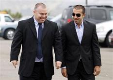Mosab Hassan Yousef, right, walks into his deportation hearing with former Israeli security service agent Gonen Ben-Itzhak, left, at the immigration detention center in San Diego Wednesday, June 30, 2010.