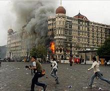 Flames and smoke poured from the Taj hotel in Mumbai, India