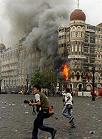 Flames and smoke poured from the Taj hotel in Mumbai, India