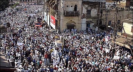 Indian Muslim protesters walk during a silent procession in Bhopal, India, Friday, Feb. 10, 2006. Thousands of Indian Muslims participated in the march to protest the publication of cartoons depicting the Prophet Muhammad in Danish newspapers. Prakash Hatvalne -- AP