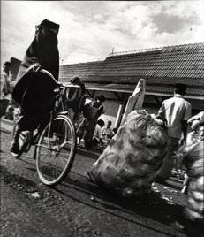 muslim woman on a bike