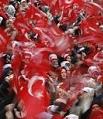 People wave Turkish flags during an anti-Pope rally organised by the Islam-based Welfare Party in Istanbul November 26, 2006. Pope Benedict XVI is expected to arrive in Turkey on Tuesday. (Pawel Kopczynski/Reuters)