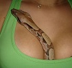woman in green with snake