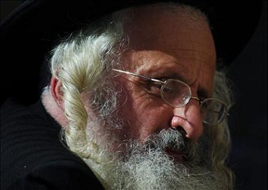 An Orthodox Jew prays at the Wailing Wall in the Old City of Jerusalem July 28, 2006. Many Jews prayed at the Wailing Wall before the Shabbat for the end of Israel's month-long offensive into the Gaza Strip and the conflict with Lebanon's Hizbollah