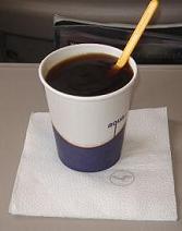 fly in the coffee cup