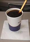 fly in the coffee cup