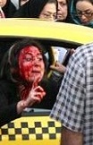 Iranian woman beaten for not wearing veil