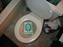 koran in toilet