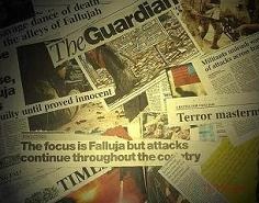 a focus on headlines from the papers about the war on Iraq