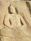A survived statue of Buddha carved into a rock is seen in Jehanabad. 