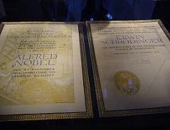 Two Nobel Prize certificates on display at the Nobel Museum in Stockholm, Sweden