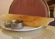 A plate of Dosa with Chutney and Sambhar