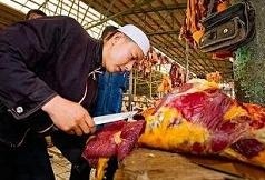 muslim cutting meat