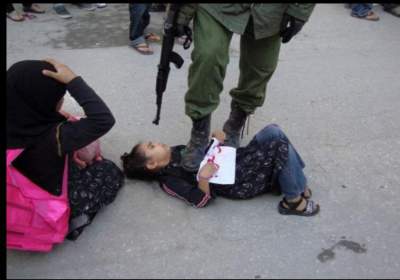 fake image of Israeli soldier with boot on Palestinian school girl