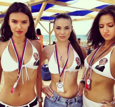 showing their support for the Russian president with their Putinkinis